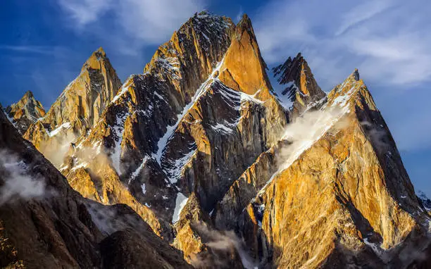 The Trango Towers are a family of rock towers situated in Gilgit-Baltistan, in the north of Pakistan. The Towers offer some of the largest cliffs and most challenging rock climbing in the world, and every year a number of expeditions from all corners of the globe visit Karakoram to climb the difficult granite.