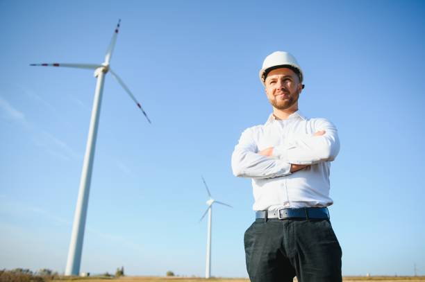 istock Technician Engineer in Wind Turbine Power Generator Station 1452555358