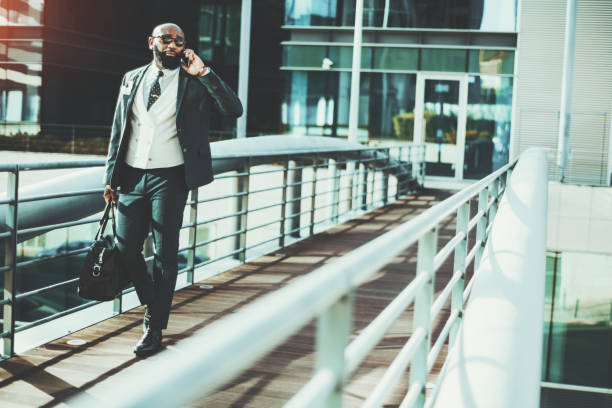 istock Male on the move while on the phone 1452558773