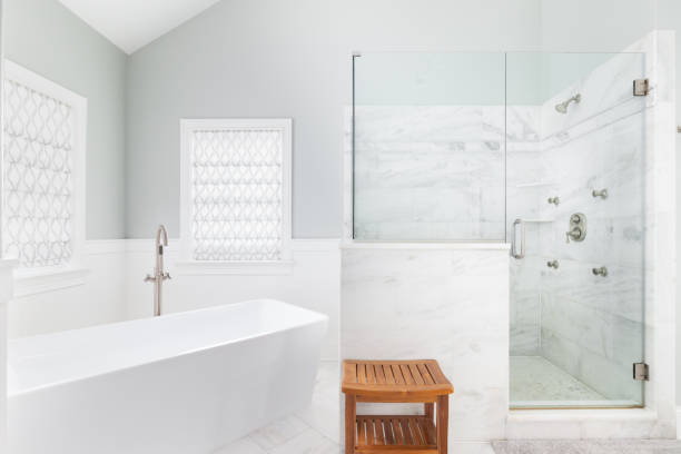 istock A bathroom's standalone tub and marble tiled shower. 1452561557