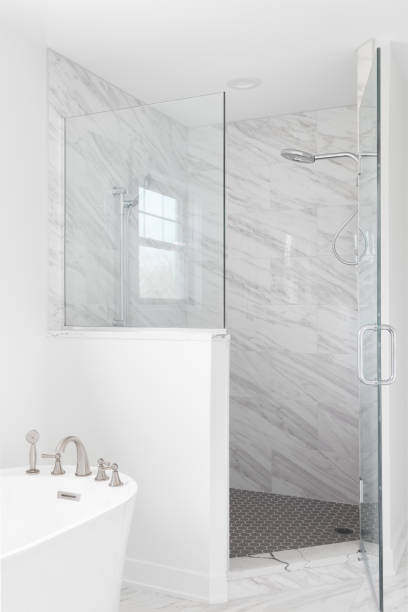 istock A standalone tub and marble tiled shower. 1452562261