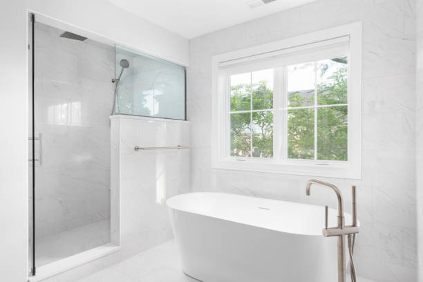 istock A bathroom with a freestanding tub and marble tiled shower. 1452562386