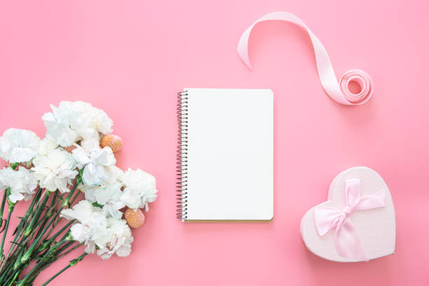 istock Blank notepad, flower and heart shaped gift box, flat lay. 1452563293