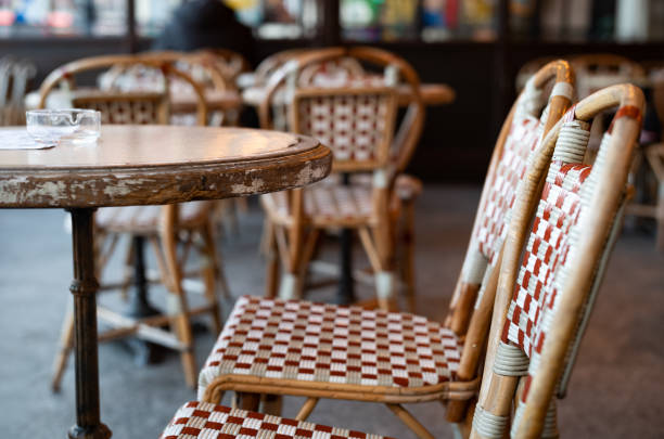 istock Red and white chairs in a typical Parisian bistrot 1452563653