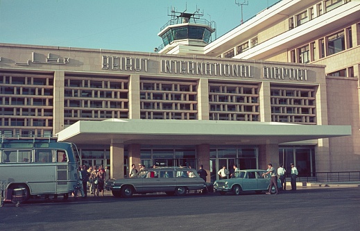 Beirut, Lebanon, 1965. The former entrance to the airport building in Beirut. Also: travellers, tourists, locals and parked vehicles.