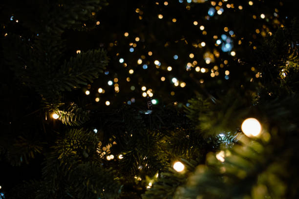 istock Christmas tree decorated with garlands wallpaper 1452578575