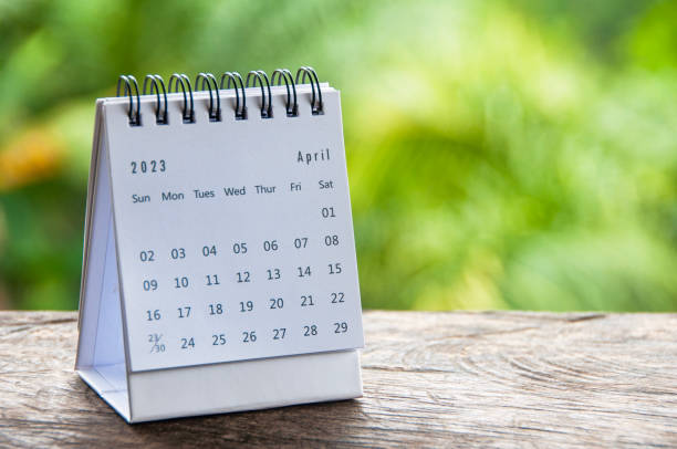 istock April 2023 table calendar with customizable space for text or ideas. Monthly calendar concept and copy space. 1452580148