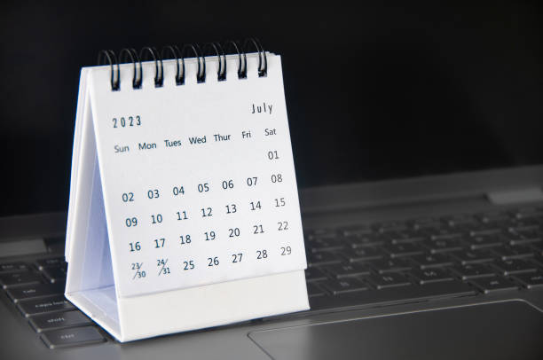 istock July 2023 table calendar with customizable space for text or ideas. Monthly calendar concept and copy space. 1452580175