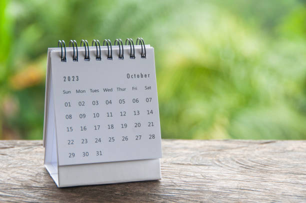 istock October 2023 table calendar with customizable space for text or ideas. Monthly calendar concept and copy space. 1452580247