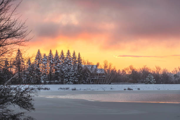 istock Stunning winter sunrise snow covered landscape cloudscape 1452580975