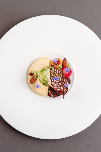 Michelin Star Dessert variation plate with vanilla tonka bean mousse stock photo