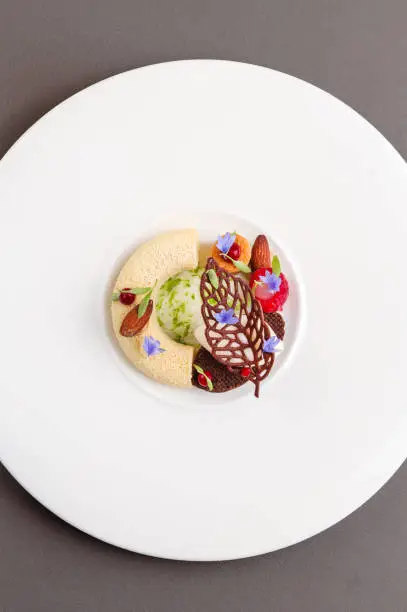 Photo of Michelin Star Dessert variation plate with vanilla tonka bean mousse