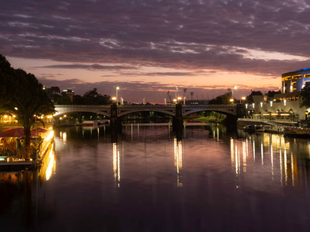 istock Sunrise on city skyline and bridge 1452582036
