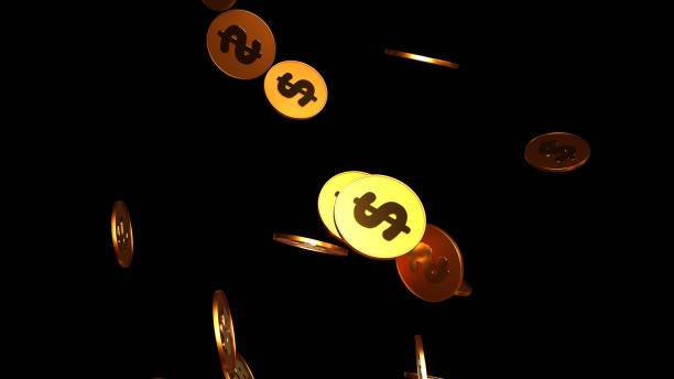 istock Many golden Dollar coins falling down. 1452589208