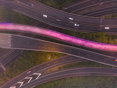 Drone aerial view of complicated intersecting highway.