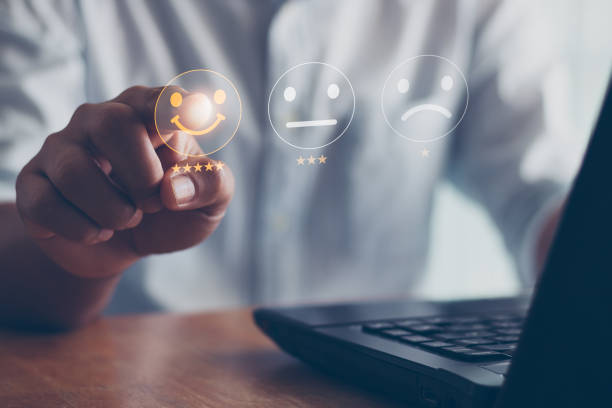 istock Customer review satisfaction feedback survey concept. Businessman using laptop computer and give rating to service experience on online application. customer service and five stars satisfaction rating 1452598354