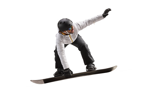 Guy in a white jacket performing a jump with a snowboard isolated on white background