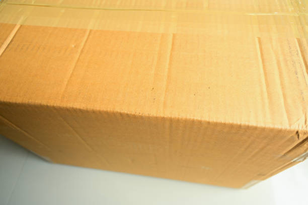 istock brown box packaging for shipping, paper textured 1452604563