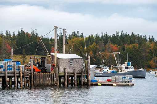 Owls Head, USA - October 15, 2021. Fishing boat and pier at Owls Head, Maine, USA