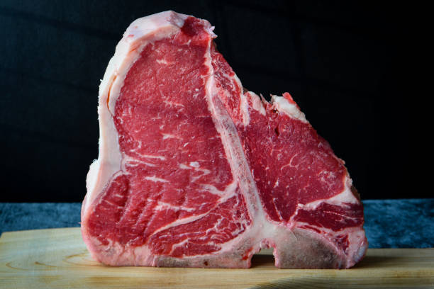 istock Thick Raw T-Bone or porterhouse Steak on the kitchen table 1452609262