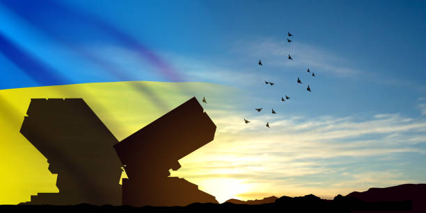 difesa aerea al tramonto con la bandiera ucraina - military air vehicle foto e immagini stock