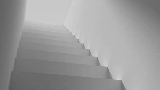 A simple staircase leading from surface level into the ground. Viewed from a low angle looking towards brightly lit entrance at the top of the composition.