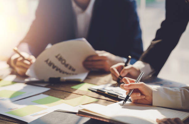 istock Team business people planning strategy brainstorming and analysis marketing and using laptop. Business meeting concept. 1452621725