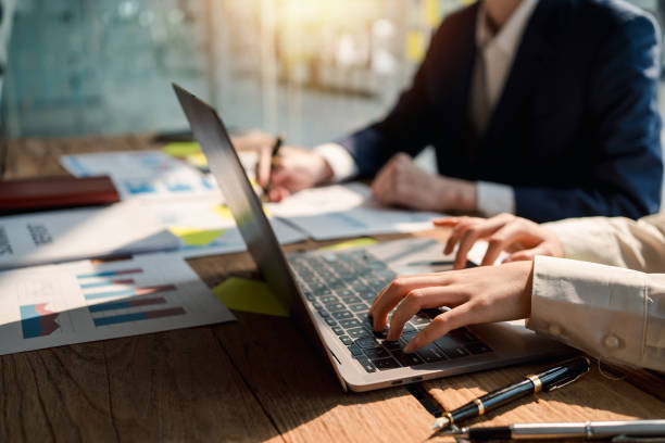 istock Team business people planning strategy brainstorming and analysis marketing and using laptop. Business meeting concept. 1452621736