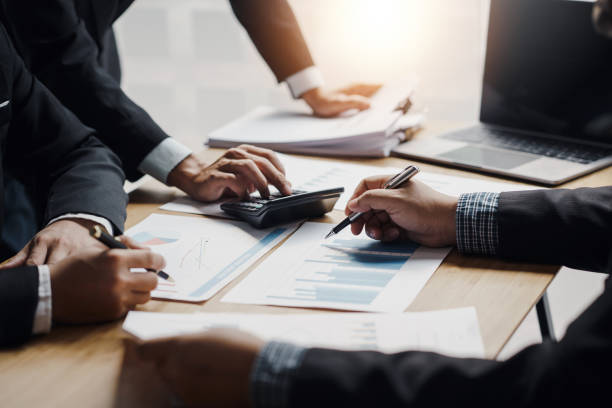 istock Team business people planning strategy brainstorming and analysis marketing and using laptop. Business meeting concept. 1452621770