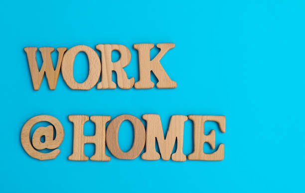 istock Wooden word work at home on blue background 1452624905