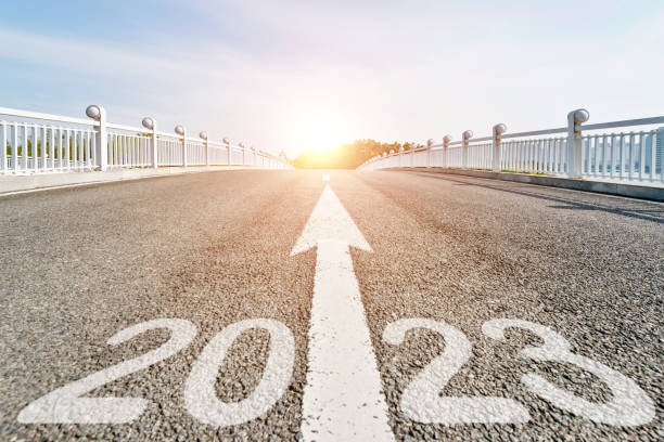 istock Number 2023 and arrow sign on asphalt pedestrian bridge 1452625656