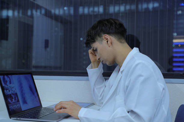 istock Doctor researching patient cases 1452631471