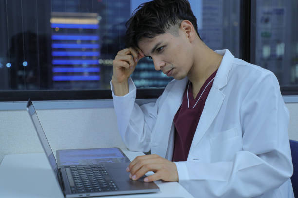 istock Doctor researching patient cases 1452631474