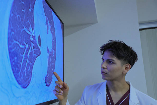 istock Young latin doctor giving a speech or presentation to colleagues 1452631477