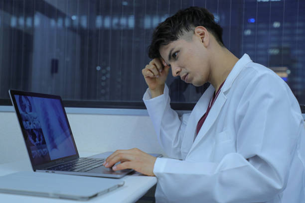 istock Doctor researching patient cases 1452631479