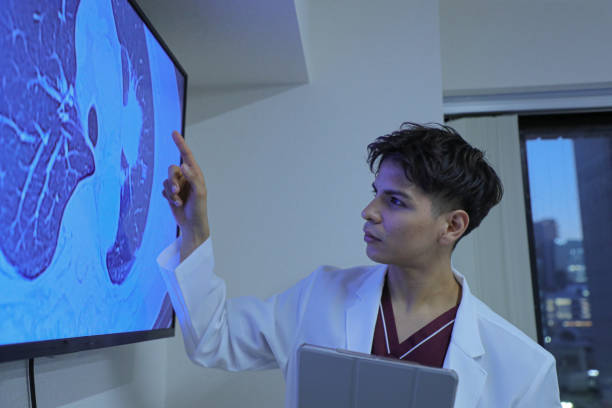 istock Young latin doctor giving a speech or presentation to colleagues 1452632136