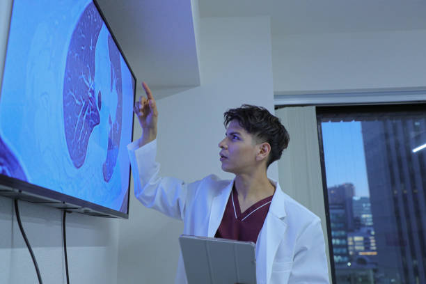 istock Young latin doctor giving a speech or presentation to colleagues 1452632168