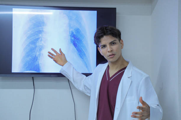 istock Young latin doctor giving a speech or presentation to colleagues 1452632170