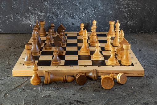 Chess is in front of other chess. The concept of a leader is to have courage and challenge in competition, leadership and business vision to win business games.
