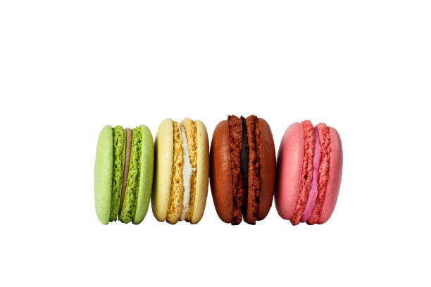 istock four vertical macaroons. green, yellow, brown and pink macarons isolated on white. without a shadow 1452633647