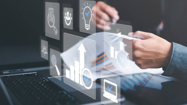istock Business people read business statistics chart reports, to analyze and improve corporate strategy, manage financial and marketing documents, update annual budget accounts, company growth data. 1452634262