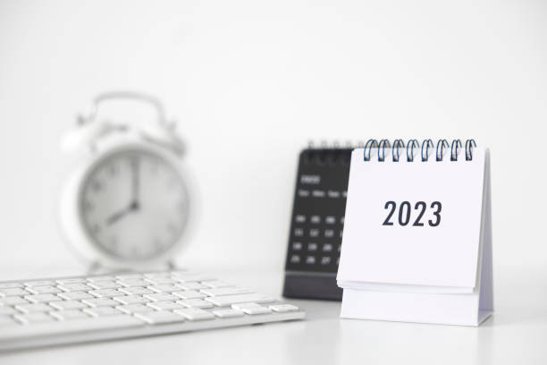 istock 2023 business calendar, keyboard and clock on office table in new year day. Make a work plan for the start of the year. Concept about Celebration, Business, Christmas, New Year. 1452636733
