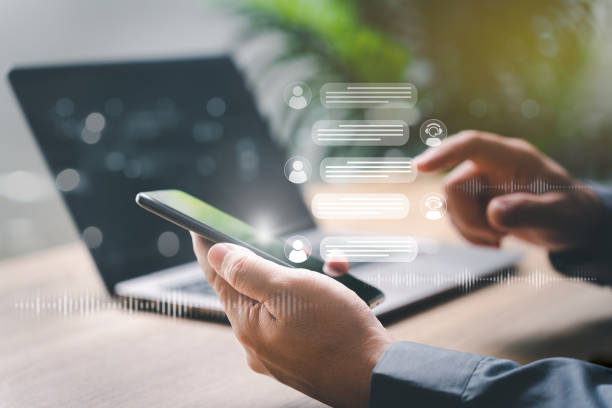 istock AI Chat intelligent digital customer service application concept, A man use smartphone conversation online chat with a service provider chatbot, answers questions and solves problems for customers 1452639694