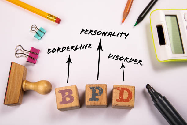 istock BPD - Borderline Personality Disorder. Wooden blocks on a white office table 1452643233
