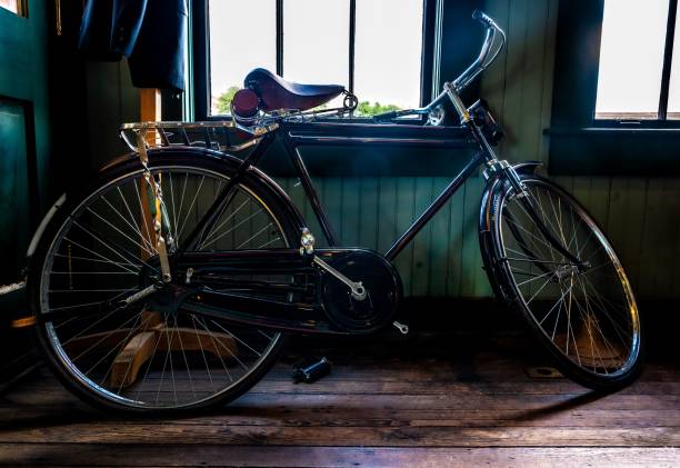 istock Modern bicycle inside a house with huge wheels on a wooden floor 1452644114