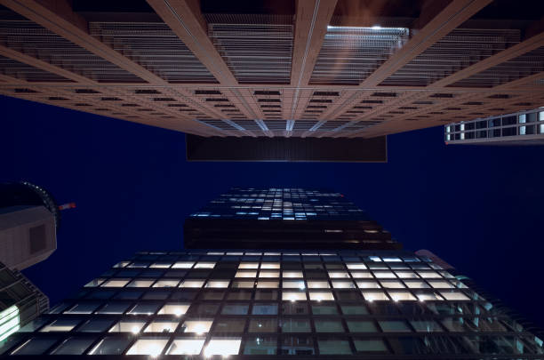 istock looking up to modern high rise office buildings 1452646643