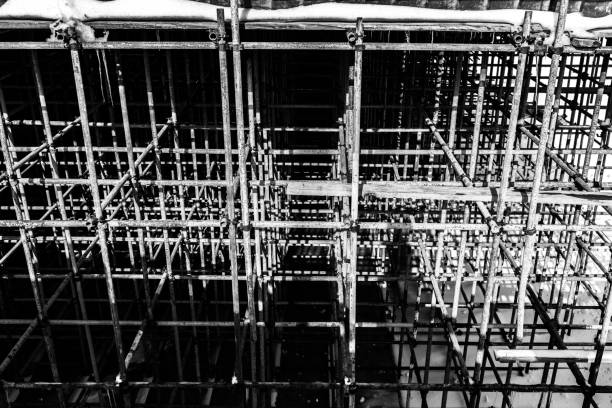 A grayscale of an electricity transmission pylon