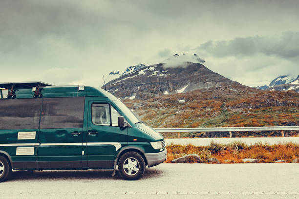 istock Camper van in mountains on roadside, Norway 1452651743