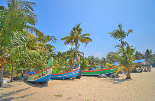 Fishing boats kept in marari sea beach in Alleppey, Kerala.