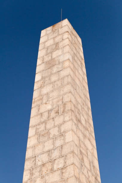 istock Stone obelisk is under blue sky. Obelisk of Fiolent Memory park 1452658045